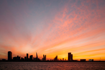 Fototapeta na wymiar Bahrain skyline and beautiful clouds during sunset