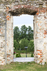Ruins of 18th century classical palace, manor complex, situated on the Nida River near Jedrzejow,...