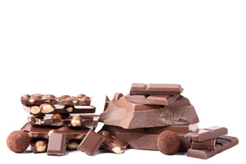 Chocolate pieces with nuts isolated on white background
