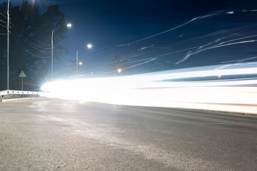 Obraz premium Large city road night scene, night car light trails