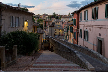 Fototapeta na wymiar View of old architecture with viaduct in Italy late afternoon