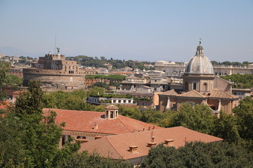 Fototapeta na wymiar View to Castel Sant’Angelo and Basilika San Giovanni Battista dei Fiorentini in Rome from the Hill Gianicolo, Italy