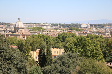 Fototapeta na wymiar View to Basilika San Giovanni Battista dei Fiorentini the historic city of Rome from the Hill Gianicolo, Italy