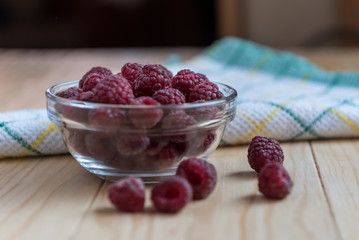 Fresh organic raspberries on a pile