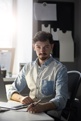Fototapeta premium Portrait of young confident entrepreneur