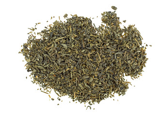 Dried green tea leaves on a white background, top view.