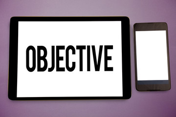 Writing note showing Objective. Business photo showcasing Goal planned to be achieved Desired target Company mission Wide framed white smart screen tablet text messages communicate idea.
