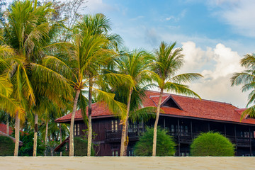 Fototapeta na wymiar Beach House or bungalow at sea sand beach, Langkawi, Malaysia