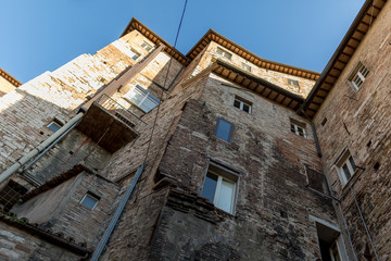 Fototapeta na wymiar Medieval architecture in Italy rising up