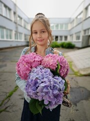 Fototapeta premium portrait of a girl with flowers