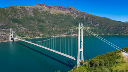 The Hardanger Bridge is a suspension bridge across the Eidfjorden branch of Hardangerfjorden in Hordaland county, Norway.