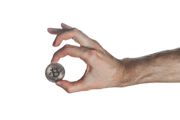 Man hand holding up bitcoin with ok sign isolated on white background. Digital symbol of a new virtual currency
