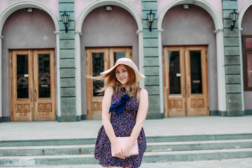 Naklejka premium happy girl summer dress on the street