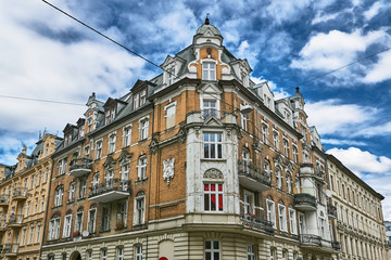 Fototapeta premium Facade of a residential building with balconies in Poznan