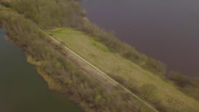 Flying over a dike between two lakes