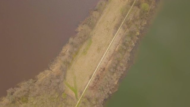 Flying over a dike between two lakes