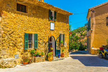 a narrow street in the spanish town Deia at Mallorca
