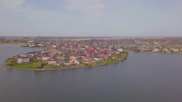 Residential area with luxurious villa's near a small lake
