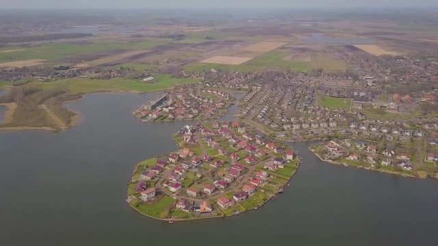 Residential area with luxurious villa's near a small lake