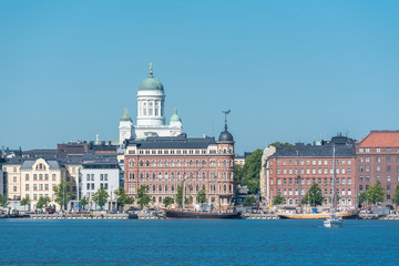 Fototapeta na wymiar Helsinki in Finland, panorama of the town from the sea, with the cathedral in background 