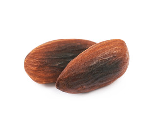 Pile of fried almond nuts isolated