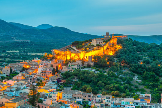 Night aerial view of Capdepera castle and Capdepera town, Mallorca, Spain