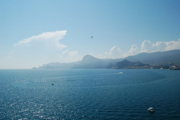 sea, rocks, trees and sky