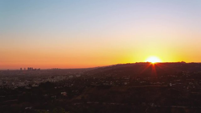 Time lapse of a sunset behind the hills in Los Angeles California