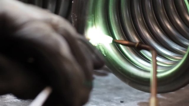 Braze welding process in a metalworking company.