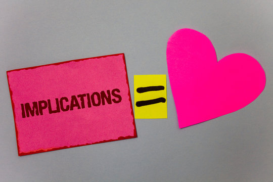 Text sign showing Implications. Conceptual photo Conclusion State of being involved Suggestion Insinuation Hint Paper Heart equal sign gray background intentions love lovely messages.