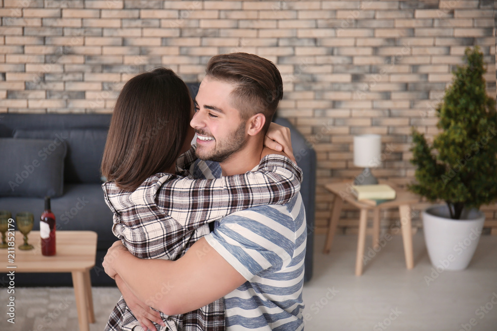 Poster beautiful young couple dancing indoors