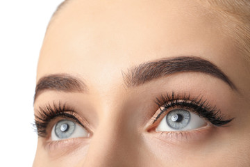 Obraz premium Young woman with beautiful eyebrows after correction, closeup