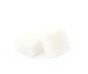 Pile of sugar cubes isolated
