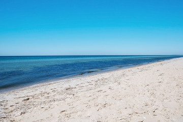 Fototapeta na wymiar Beautiful view of sandy beach on sunny summer day