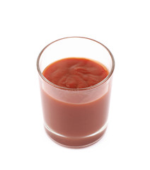 Ketchup in a glass isolated