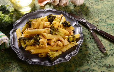Penne pasta with broccoli and chicken with cheese sauce