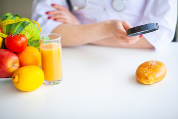 Diet. Doctor Nutritionist hold patty in her office. Concept of natural food and healthy lifestyle....