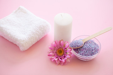 Obraz na płótnie Canvas Spa. Bath Organic Salt on Wooden Spoon on Pink Background With Copy Space.