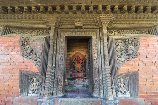 Statue of temple deity, Uma Maheshwar Temple, Kirtipur, Nepal