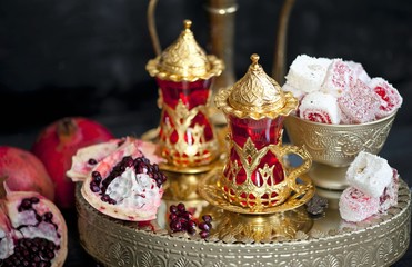 Cup with turkish tasty tea with pomegranate.Oriental tea 