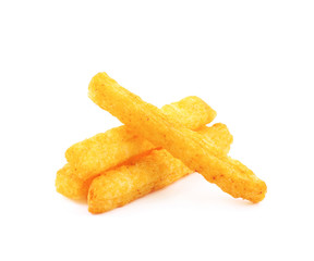 Pile of puffed cornmeal sticks isolated