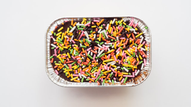 Cake Chocolate With Rainbow Topview On White Background