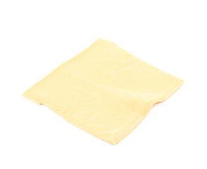 Slice of processed cheese isolated