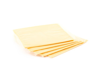 Slice of processed cheese isolated