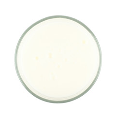 Tall glass of milk isolated