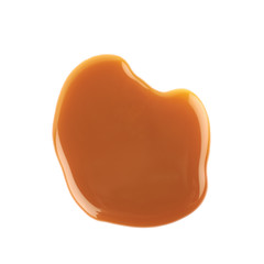 Splash of caramel sauce isolated