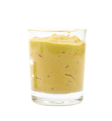 Glass shot of guacamole isolated