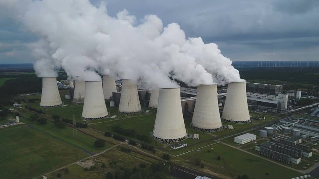 Static drone shot of huge lignite (brown coal) fired power station in Eastern Germany, heavy air pollution in Europe