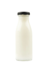 Glass bottle of milk isolated