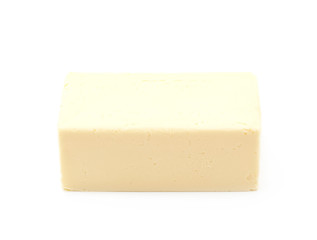 Slice block of butter isolated